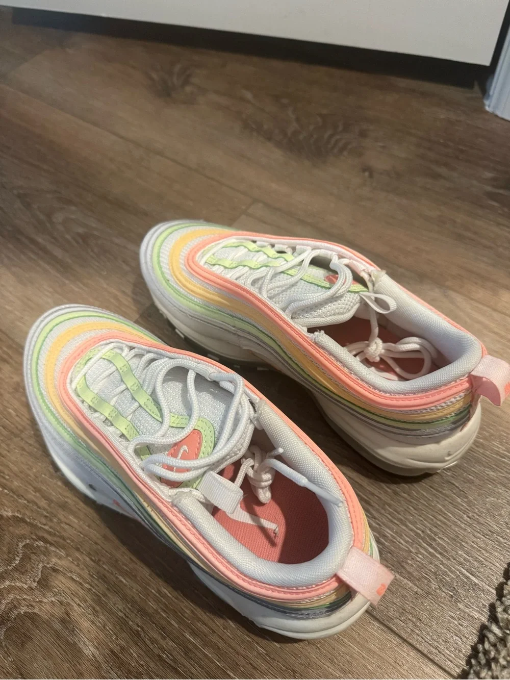 Nike Kids White Sneakers with Pastel Coral and Mint Accents